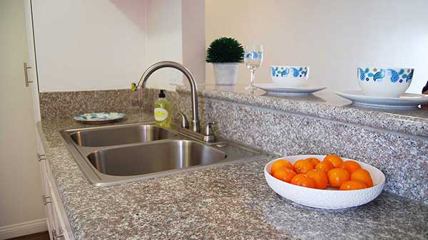 Elm Court Apartment kitchen sink and breakfast bar