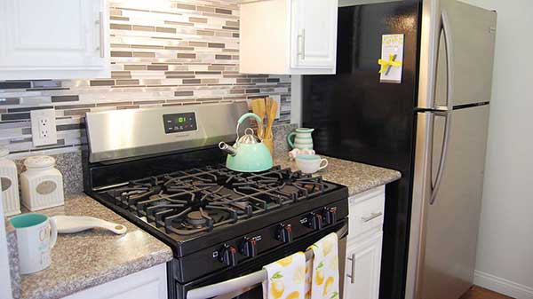 Elm Court Apartment kitchen with Stainless-steel appliances
