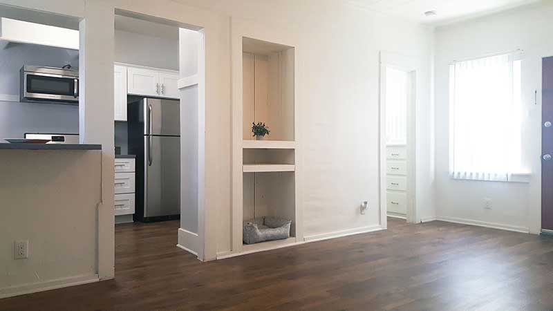 Apartment kitchen entry way and built in shelving